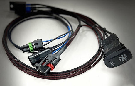 UTV Inc plug and play fan override kit, a braided wiring harness with factory style connectors and a black rocker switch labelled Fan Over Ride