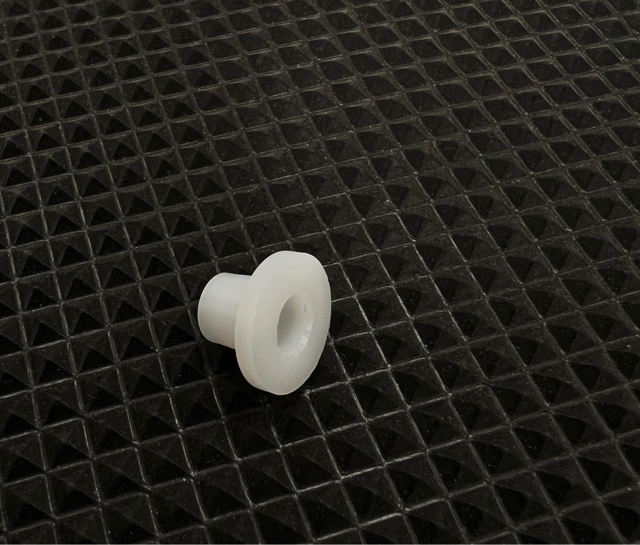 ATC70 INTAKE MANIFOLD INSULATOR BUSHING (SOLD EACH)